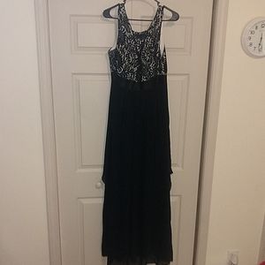 A black prom dress with white lace at the top